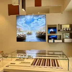 Videowall affichage dynamique pâtisserie Othmane Khoris rue du Rhône Genève DIGICAST.